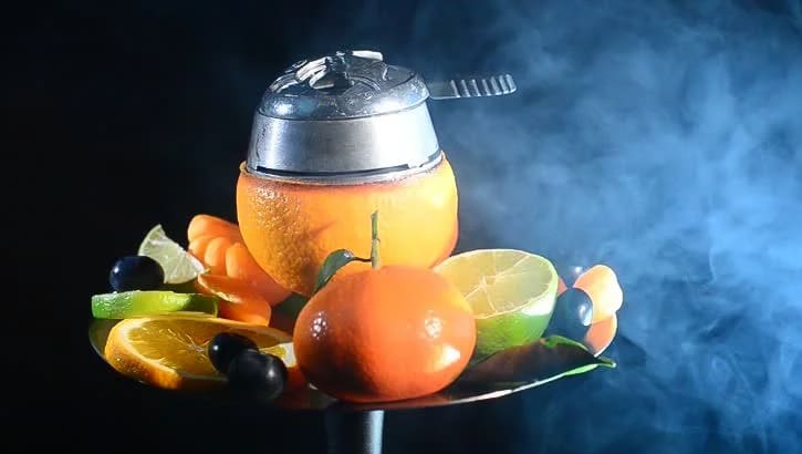 Hacer cachimba de pomelo. 